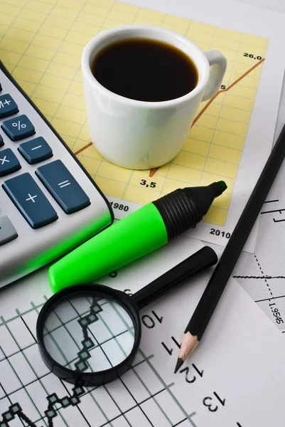 Cup coffee and diagram — Stock Photo, Image