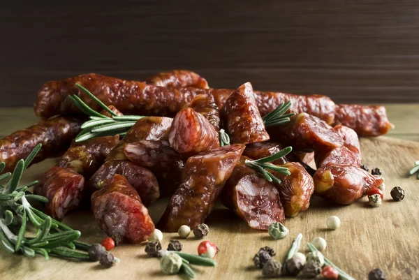 Smoked sausage with rosemary and peppercorns — Stock Photo, Image