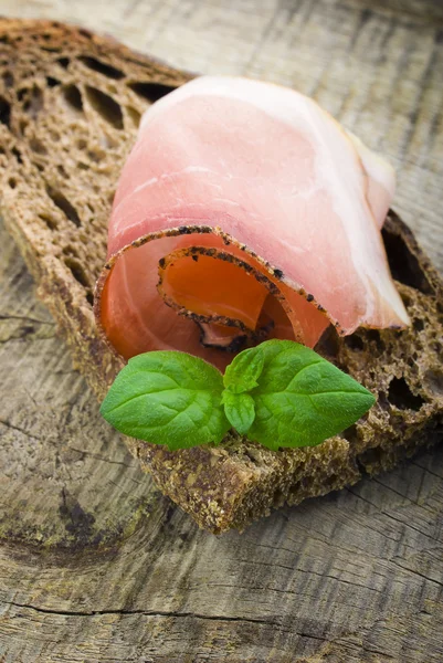 Bread with sliced pork ham — Stock Photo, Image