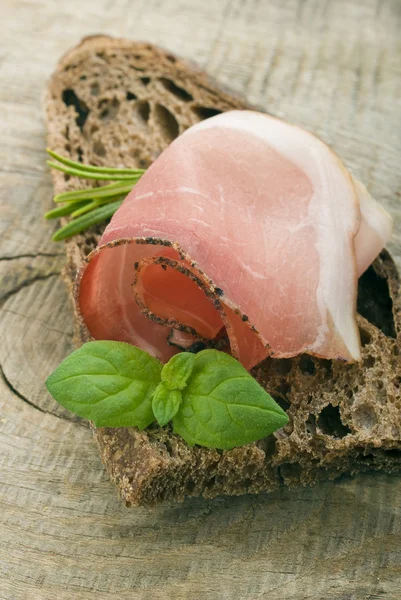 Bread with sliced pork ham — Stock Photo, Image