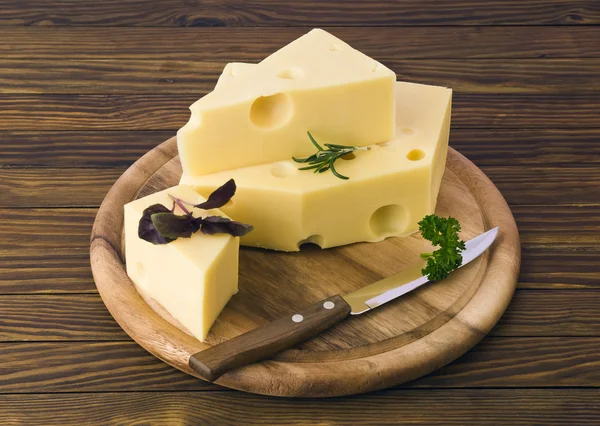 Cheese on wooden board — Stock Photo, Image