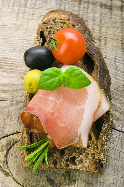 Bread with sliced pork ham — Stock Photo, Image