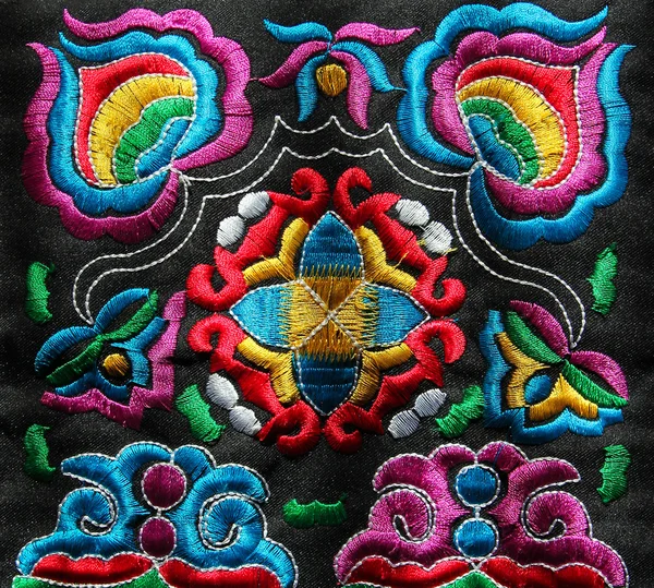 Multicolor etniska hand broderi mönster Stockbild