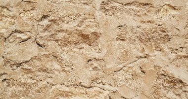 Natural texture sandstone, sun lighting, stone background