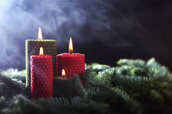Lighted Candles Fir Branches Red Green Holiday Wax Candles Fir Stock Image