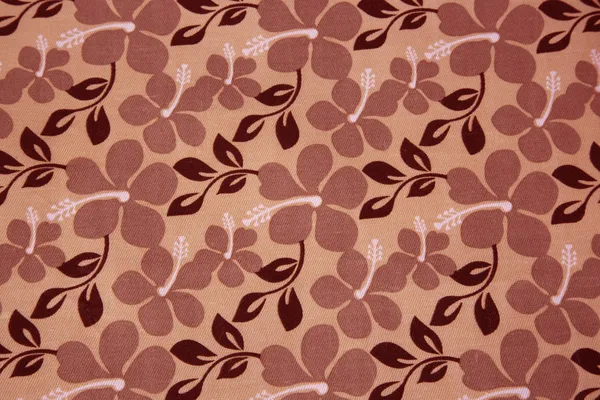 Rosa Blumen auf textilem Hintergrund — Stockfoto