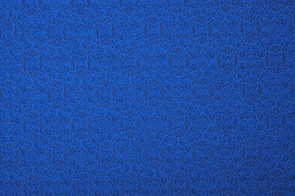 Синя тканина з квітами, фон . — стокове фото