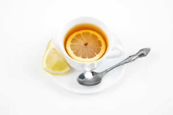 Taza de té con limón — Foto de Stock