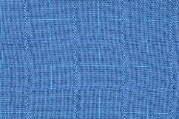 Materiaal in blauw raster, een achtergrond — Stockfoto
