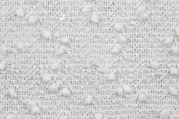 White fabric with patterns, a background