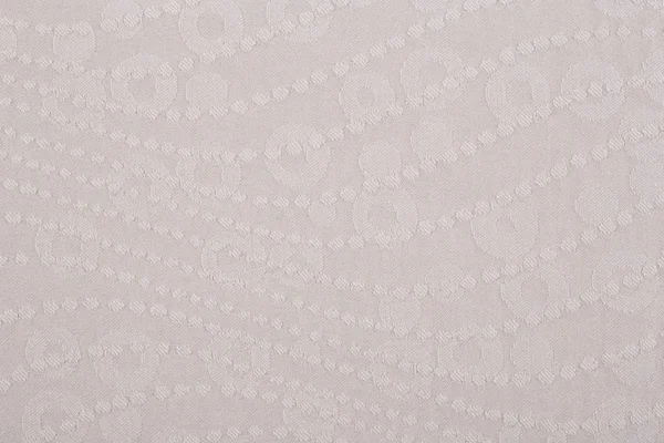 Beige fabric with abstract pattern, a background — Stock Photo, Image