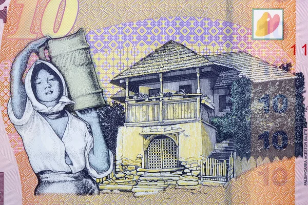 ルーマニアのお金からオルテニアと女性からの伝統的な家 Leu — ストック写真