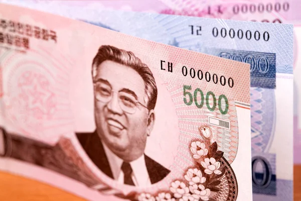 朝鲜货币 赢得了商业背景 — 图库照片