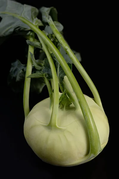 Close Raw Kohlrabi Turnip Its Foliage Dark Background — Stock Photo, Image