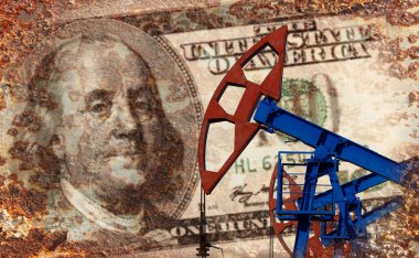 Petrol pompasının arka plandaki dolar banknotlarına yakın plan. 