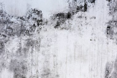 Eski beyaz-gri duvarın kalıplı makro doku parçası 