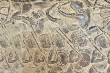 Kamboçya 'daki Angkor Wat Tapınağı' nın eski kaya oymacılarının yakın çekim dokusu.