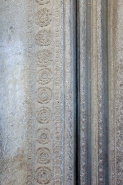 Kamboçya 'daki Angkor Wat Tapınağı' nın eski kaya oymacılarının yakın çekim dokusu.