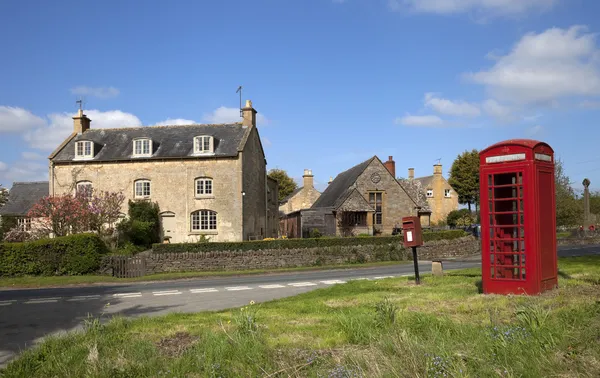Cotswold village with phone box — Stock Photo, Image