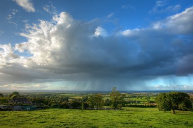 Rain falling over Gloucestershire clipart
