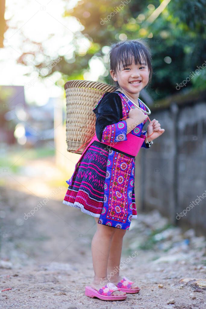 Little adorable kid in Hmong costume