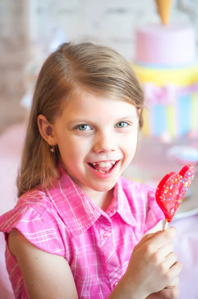 Girl with sweets — Stock Photo, Image