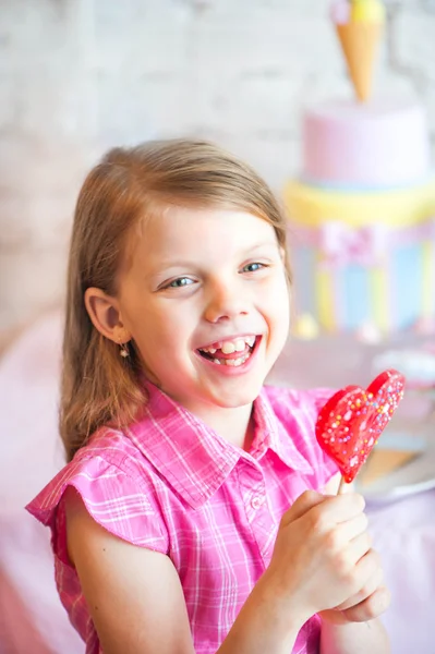 Girl with sweets — Stock Photo, Image