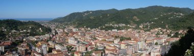 panorama from via Codena viewpoint on the city of Carrara and on the Tyrrhenian Sea clipart