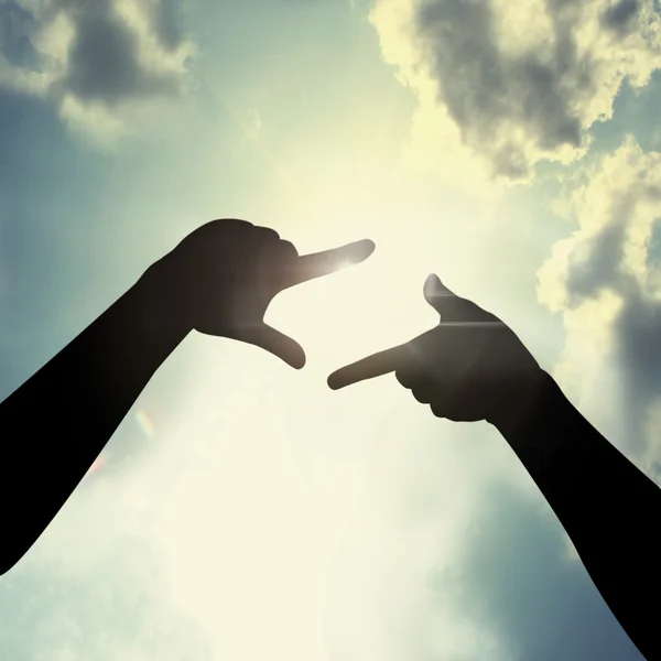 Hand framing in sky — Stock Photo, Image