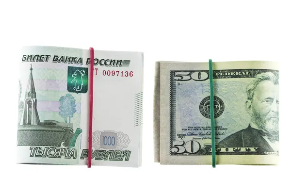 Two packs of 1000 - ruble and 50 - dollar bills, tapered elastic — Stock Photo, Image