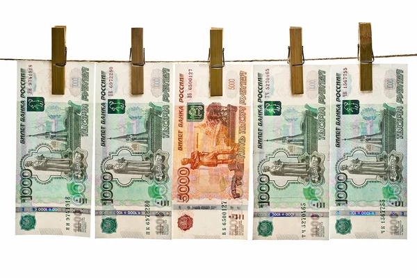 Russian banknotes hanging on a rope — Stock Photo, Image