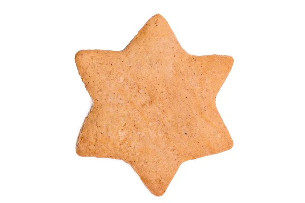 Beyaz arkaplanda izole edilmiş zencefilli kurabiye yıldızı