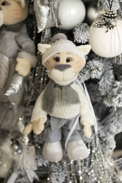 Close up of gray-white Christmas tree with soft tigers, toys, and garlands — Stock Photo, Image