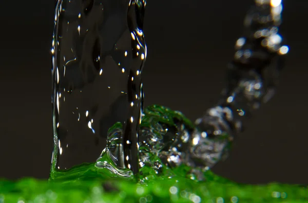 Salpicadura de agua verde — Foto de Stock