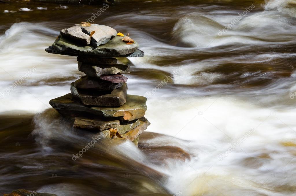 Flat Rocks Stacked in a River