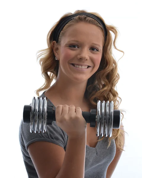 Mädchen stemmt Gewichte — Stockfoto