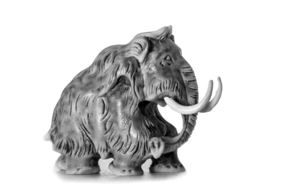 Mammoth a figurine a souvenir isolated on the white — Stock Photo, Image