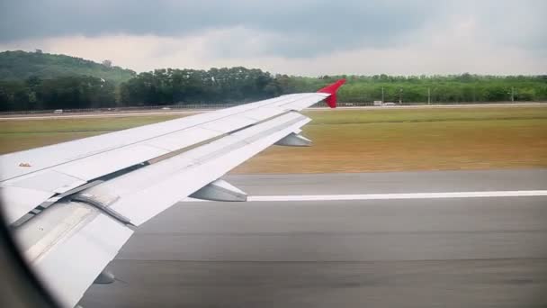 View from the airplane window. Takeoff from the airport of Phuket Island. Thailand — Stock Video