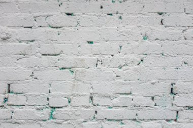 Eski püskü beyaz bir duvarın soyut klasik arka planı. Yakın plan.