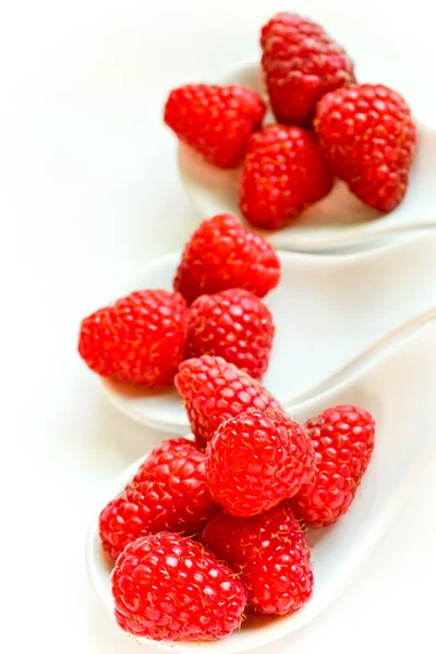 Three spoons of fresh raspberries — Stock Photo, Image