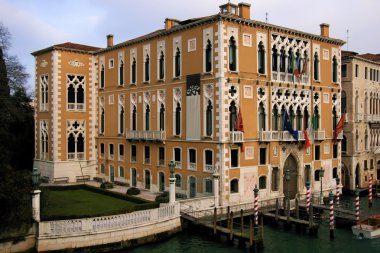 Buildings and gondolas in the Grand canal of Venice clipart