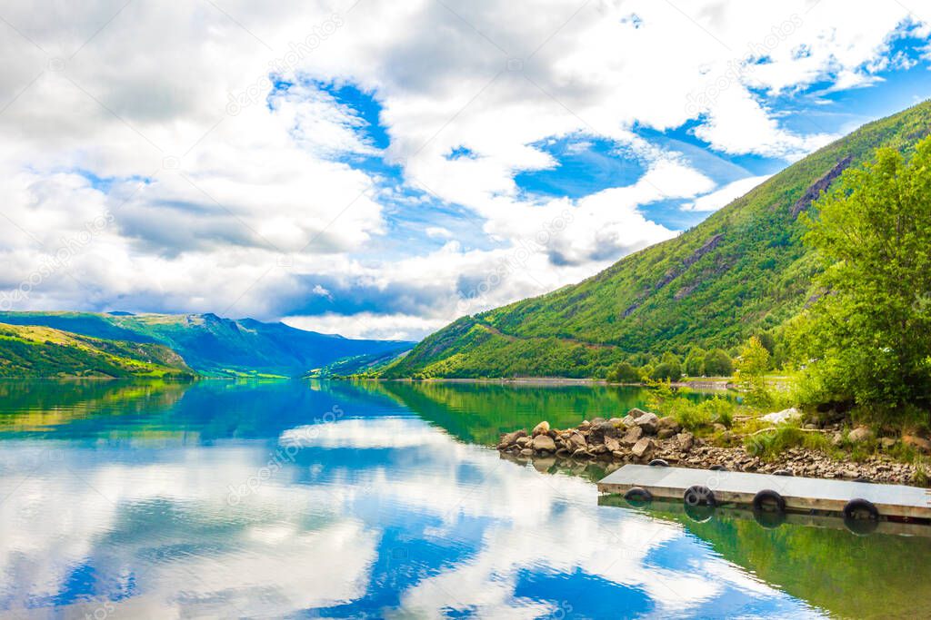 Amazing incredible norwegian landscape with colorful mountains fjord and forests in Jotunheimen National Park Norway.