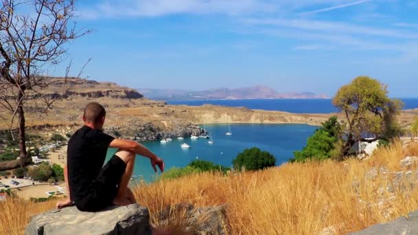 Russian Tourist Traveler Rock Lindos Beach Bay Panorama View Turquoise — Stock Video