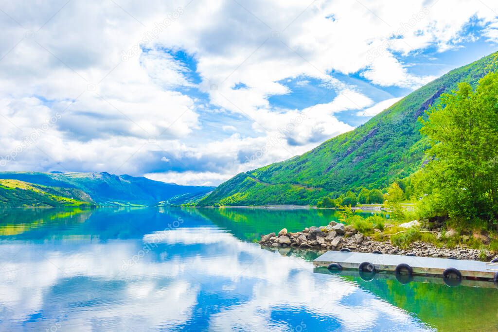 Amazing incredible norwegian landscape with colorful mountains fjord and forests in Jotunheimen National Park Norway.