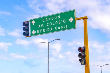 Playa del Carmen Mexico 21. December 2021 Green turquoise road sign at the highway in the city of Playa del Carmen Quintana Roo Mexico.