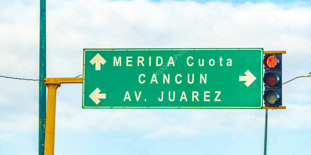 Playa del Carmen Mexico 21. December 2021 Green turquoise road sign at the highway in the city of Playa del Carmen Quintana Roo Mexico.