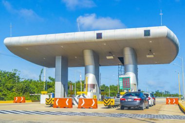 Quintana Roo Mexico 21. December 2021 Driving on the highway thru the Caseta de Cobro toll booth house of Quintana Roo and Lazaro Cardenas Mexico.