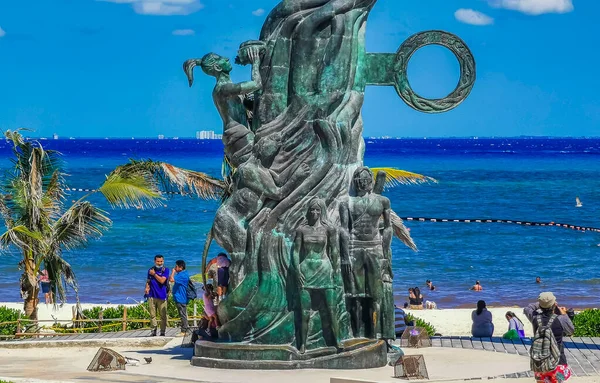 Playa del Carmen Mexico 14. May 2022 The ancient architecture of the Portal Maya in the Fundadores park with blue sky and turquoise seascape and beach panorama in Playa del Carmen Quintana Roo Mexico.