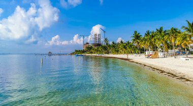 Beautiful Playa Azul beach and seascape panorama with blue turquoise water hotels resorts and palm trees in Cancun Quintana Roo Mexico.