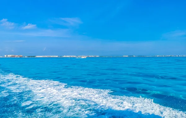 Boat trip from Cancun to Island Mujeres Isla Contoy and Whale shark tour with natural tropical beach seascape panorama blue turquoise green clear water and view from boat in Quintana Roo Mexico.